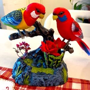 Mimicking parakeets, comes with three AA batteries not included, repeat .